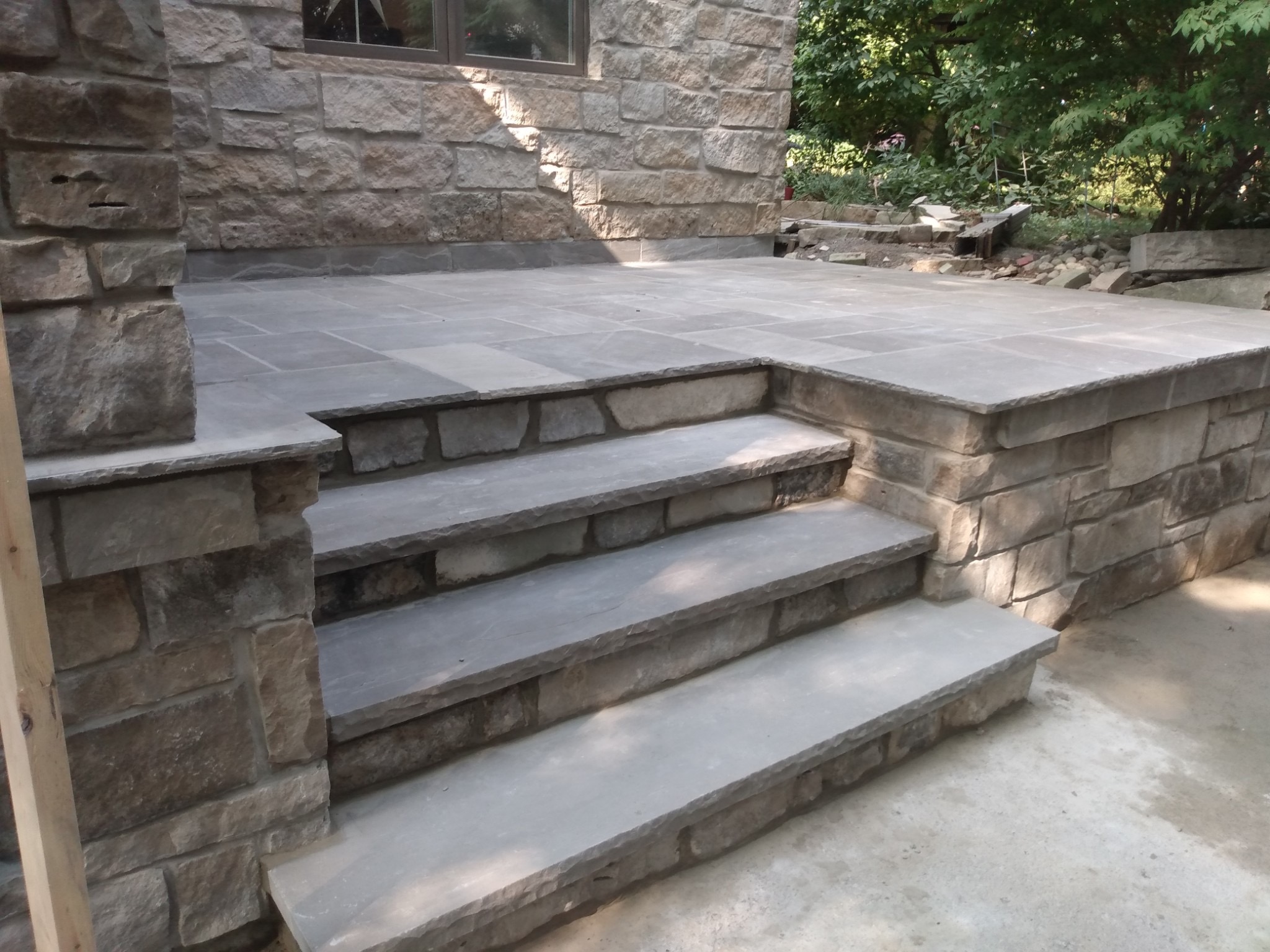 Professional flagstone installation for outdoor living spaces in Toronto