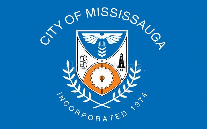 This image depicts the official seal or coat of arms of the City of Mississauga Ontario Canada The seal features a shield with various symbols including a winged hand a gear and a lighthouse The text around the shield reads City of Mississauga Incorporated 1974 The overall design and imagery suggest this is the official emblem or logo representing the city of Mississauga